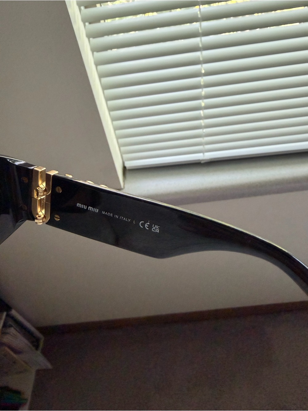 Miu Miu Black Sunglasses with Gold Logo Accent - Picture 5 of 10